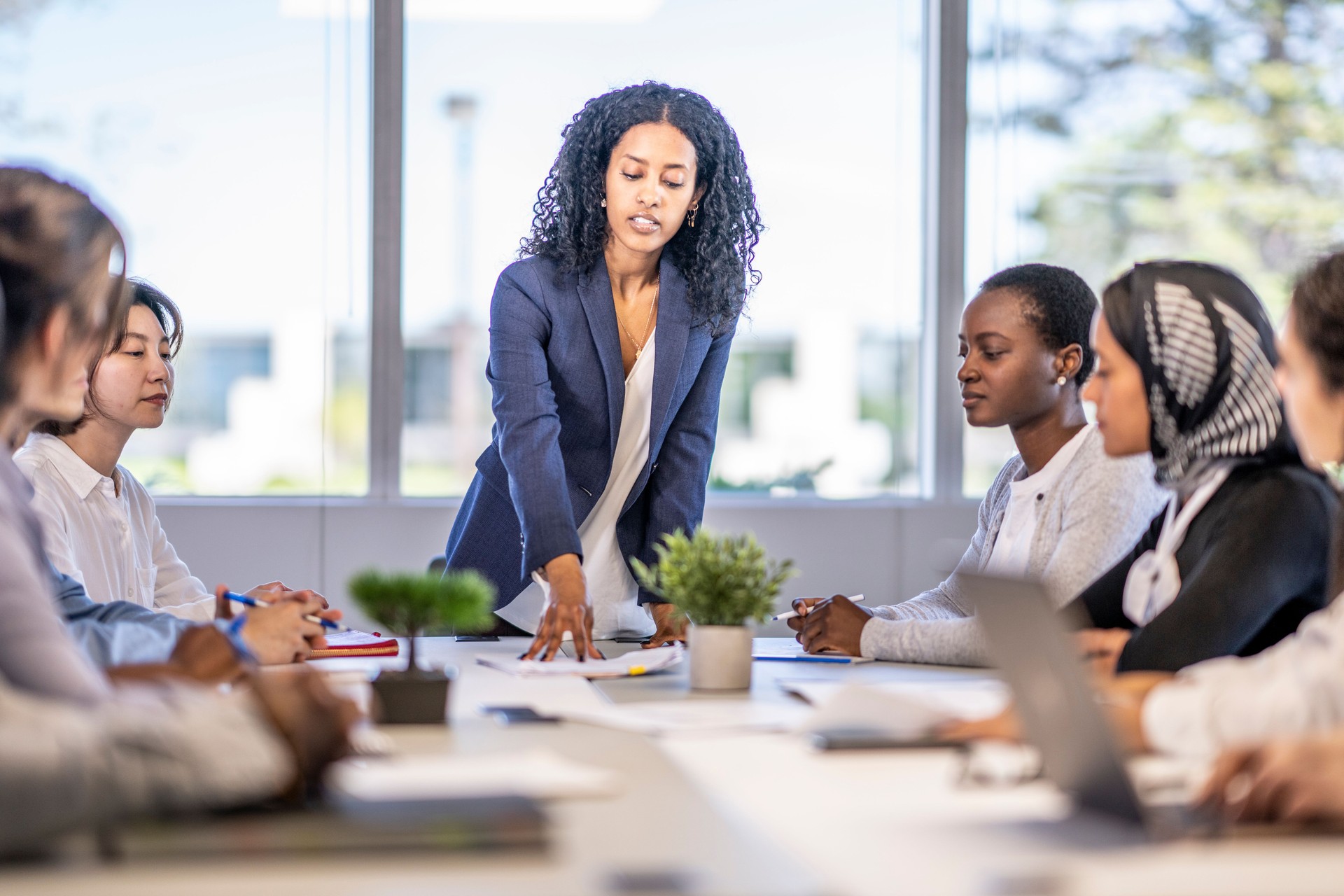 Woman Leading a Corporate Business Meeting